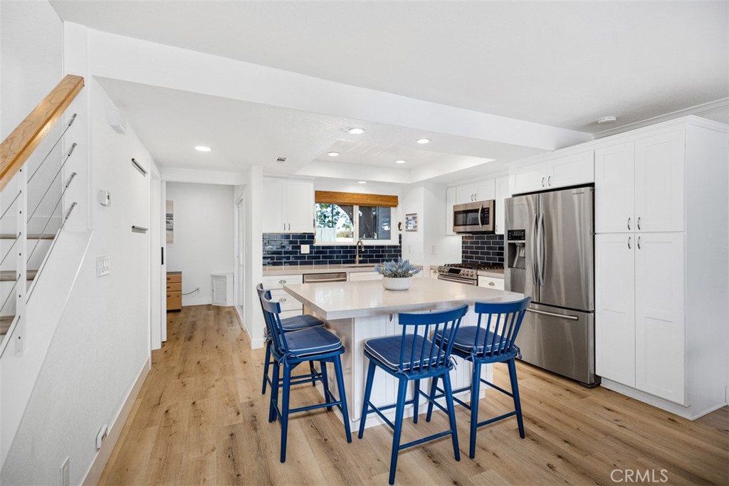 24562 Harbor View Drive, Unit 18 Dana Point, CA 92629 - Photo 9 of 33 a view of a dining room with furniture
