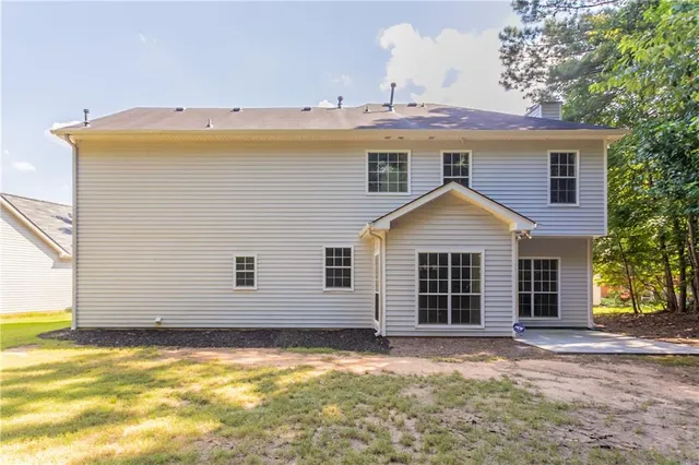 a view of a house with a ocean view