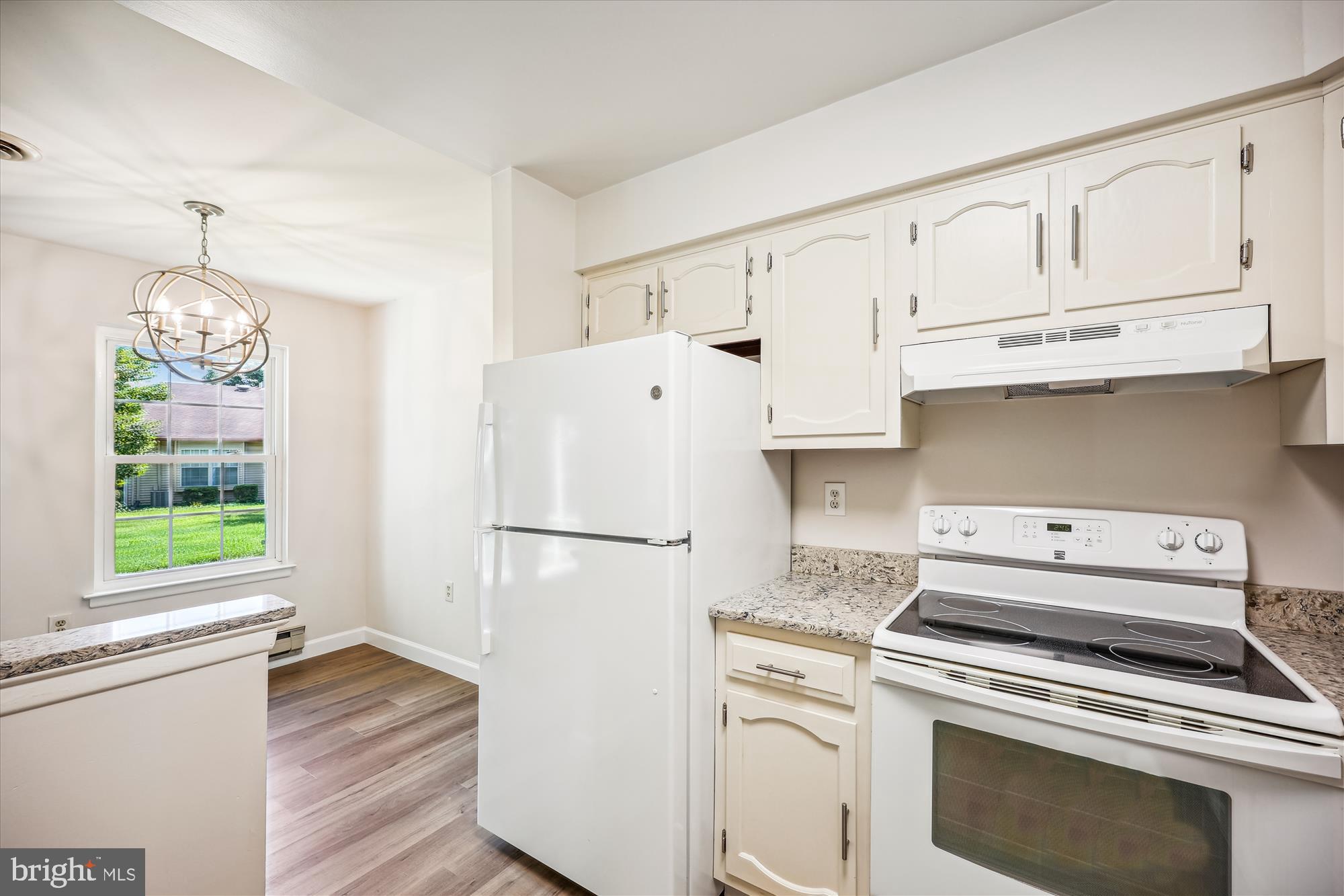 7040 Basswood Road, Unit 11 Frederick, MD 21703 - Photo 15 of 41 Kitchen open to dining room