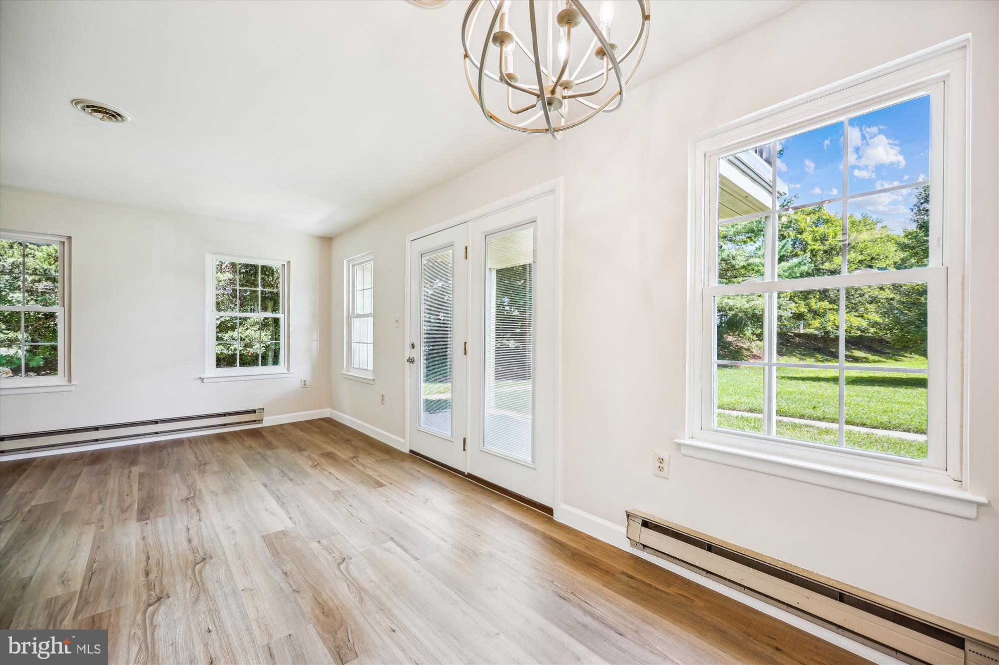7040 Basswood Road, Unit 11 Frederick, MD 21703 - Photo 16 of 41 French door to covered patio