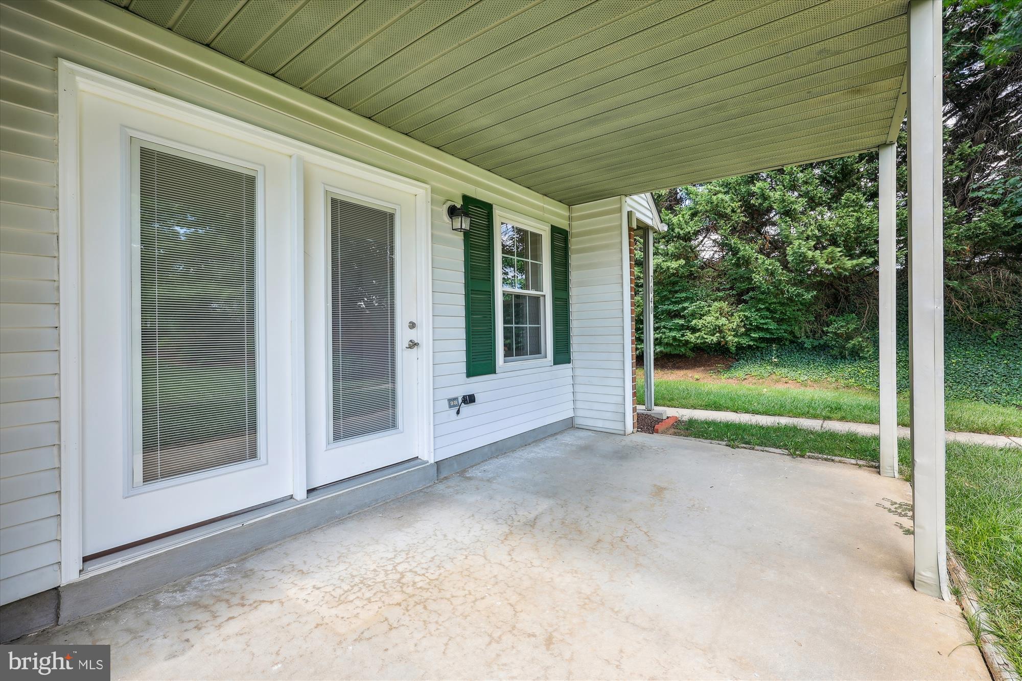 7040 Basswood Road, Unit 11 Frederick, MD 21703 - Photo 18 of 41 Covered patio with beaded ceiling