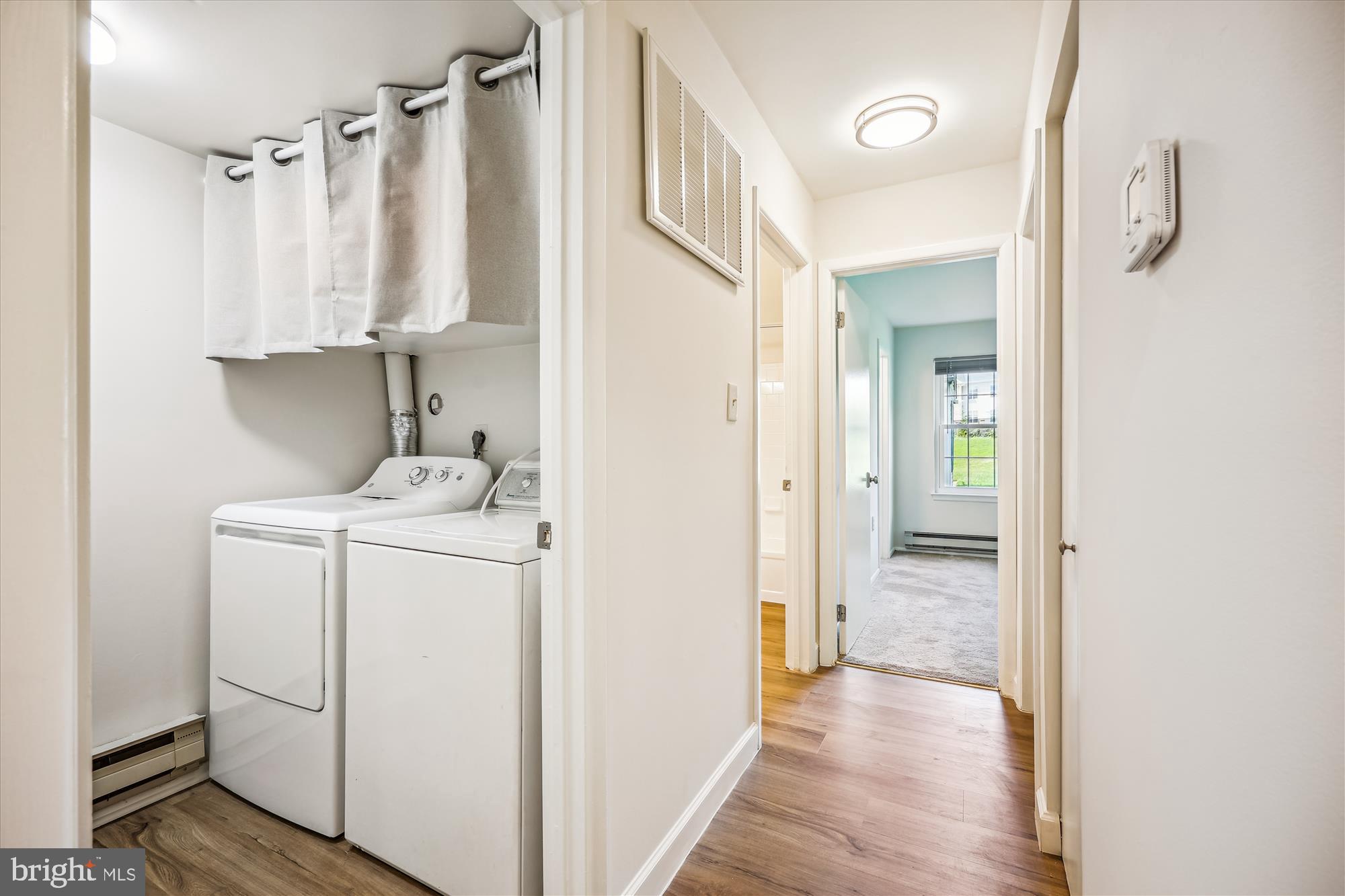 7040 Basswood Road, Unit 11 Frederick, MD 21703 - Photo 21 of 41 Laundry Room with full-size Washer & Dryer