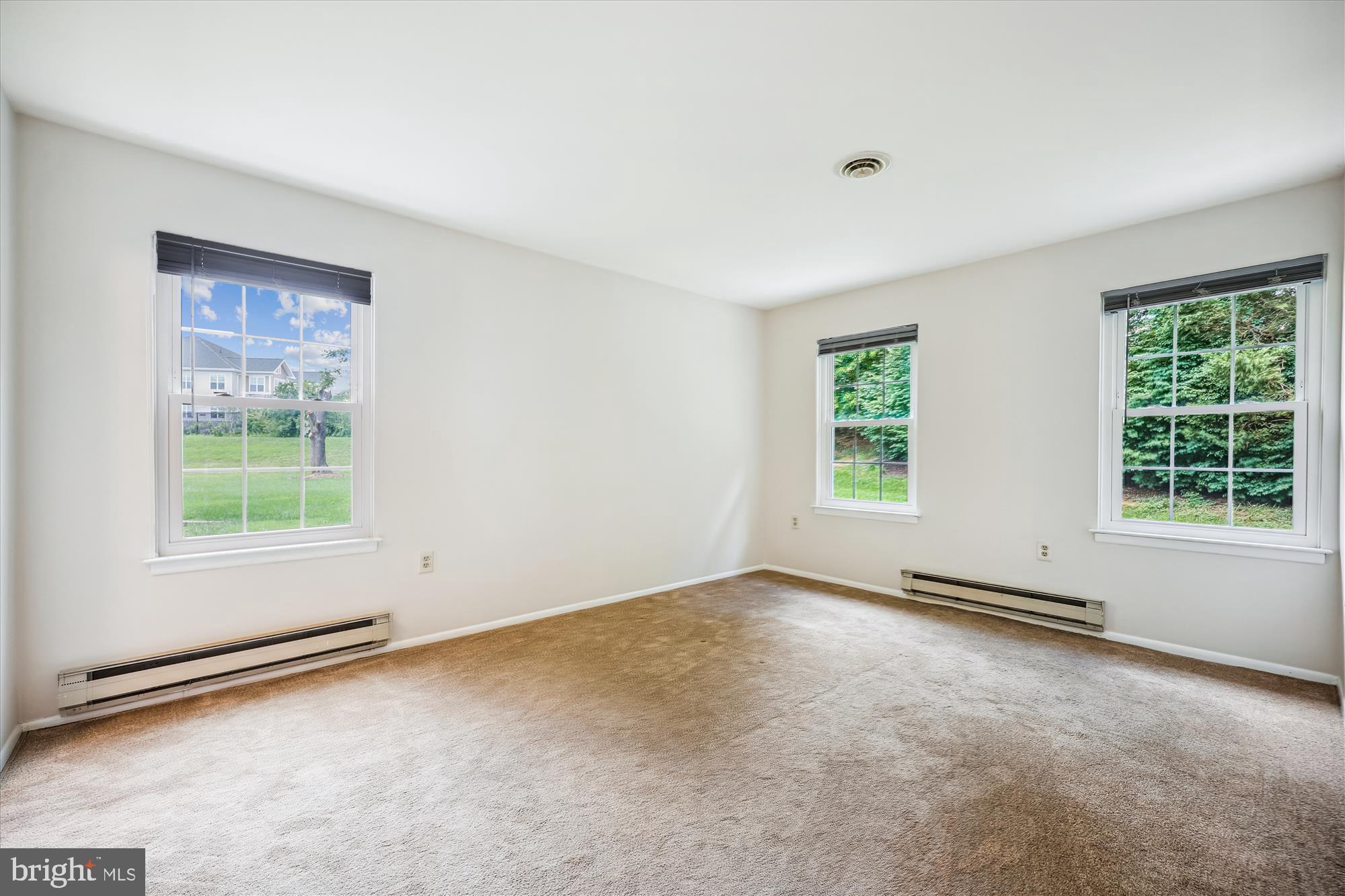 7040 Basswood Road, Unit 11 Frederick, MD 21703 - Photo 23 of 41 Primary bedroom with double exposure