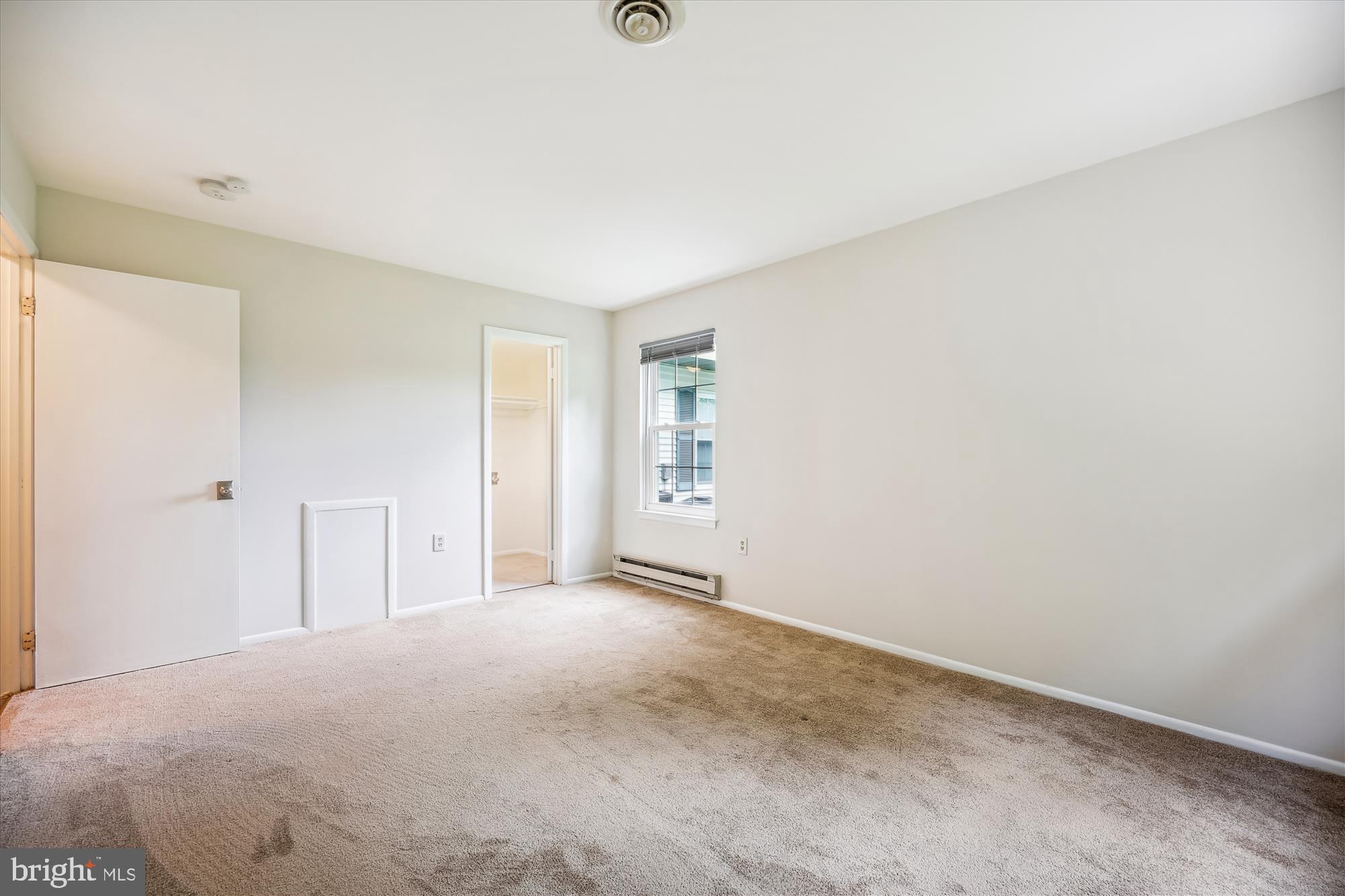 7040 Basswood Road, Unit 11 Frederick, MD 21703 - Photo 25 of 41 Primary Bedroom with Walk-in Closet