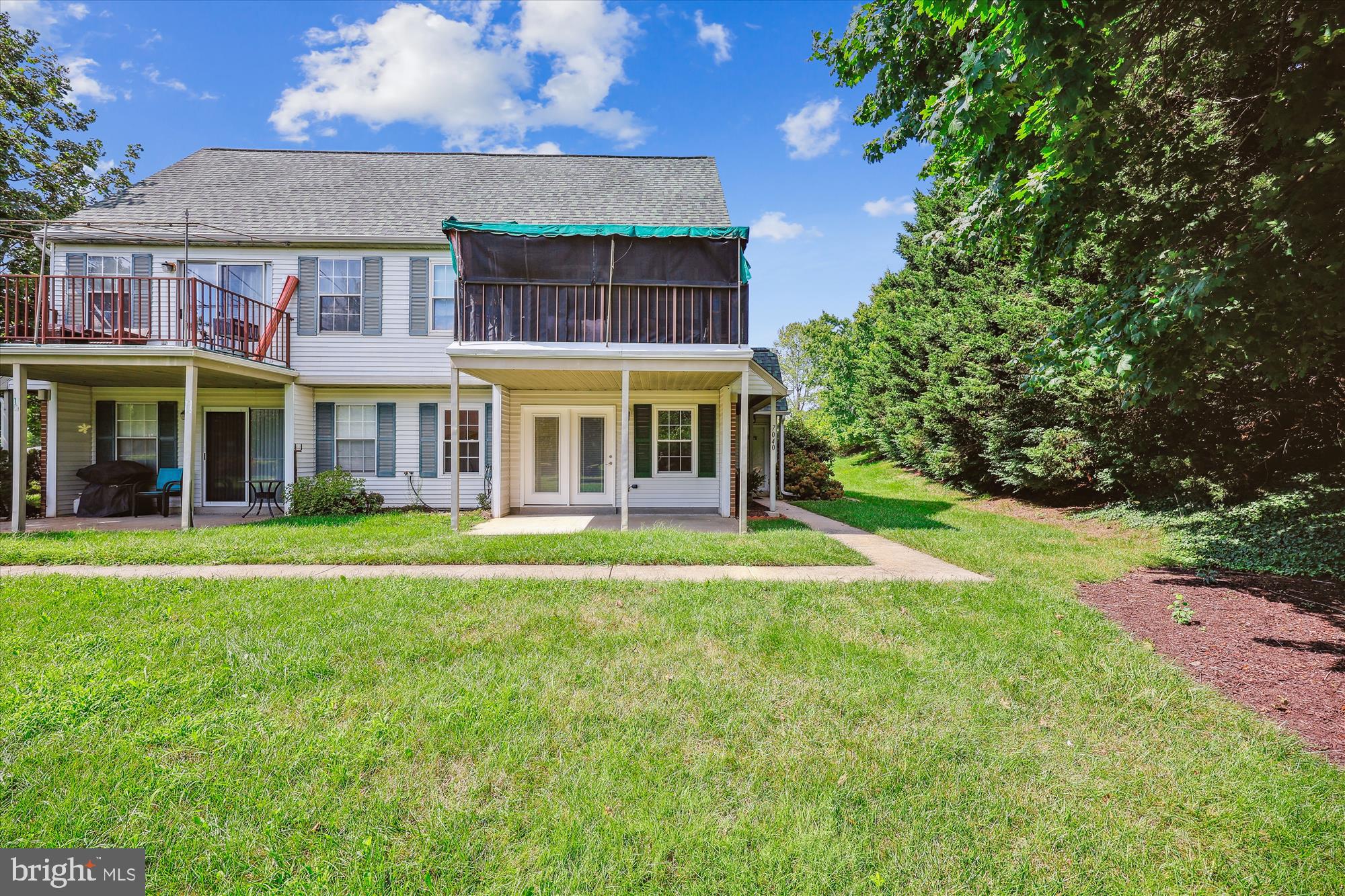 7040 Basswood Road, Unit 11 Frederick, MD 21703 - Photo 3 of 41 Covered patio and walkway to side entrance