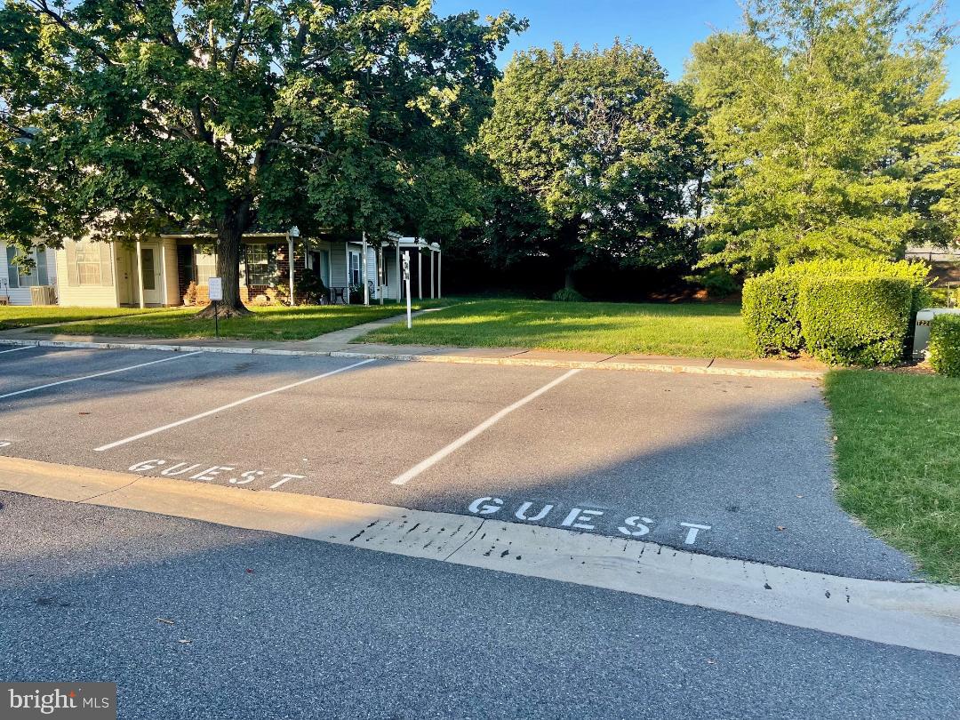 7040 Basswood Road, Unit 11 Frederick, MD 21703 - Photo 31 of 41 Guest parking in front