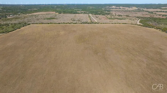an empty room with an ocean view