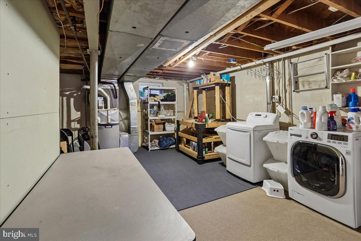 1703 Tilton Drive Silver Spring, MD 20902 - Photo 32 of 39 Spacious basement laundry area.