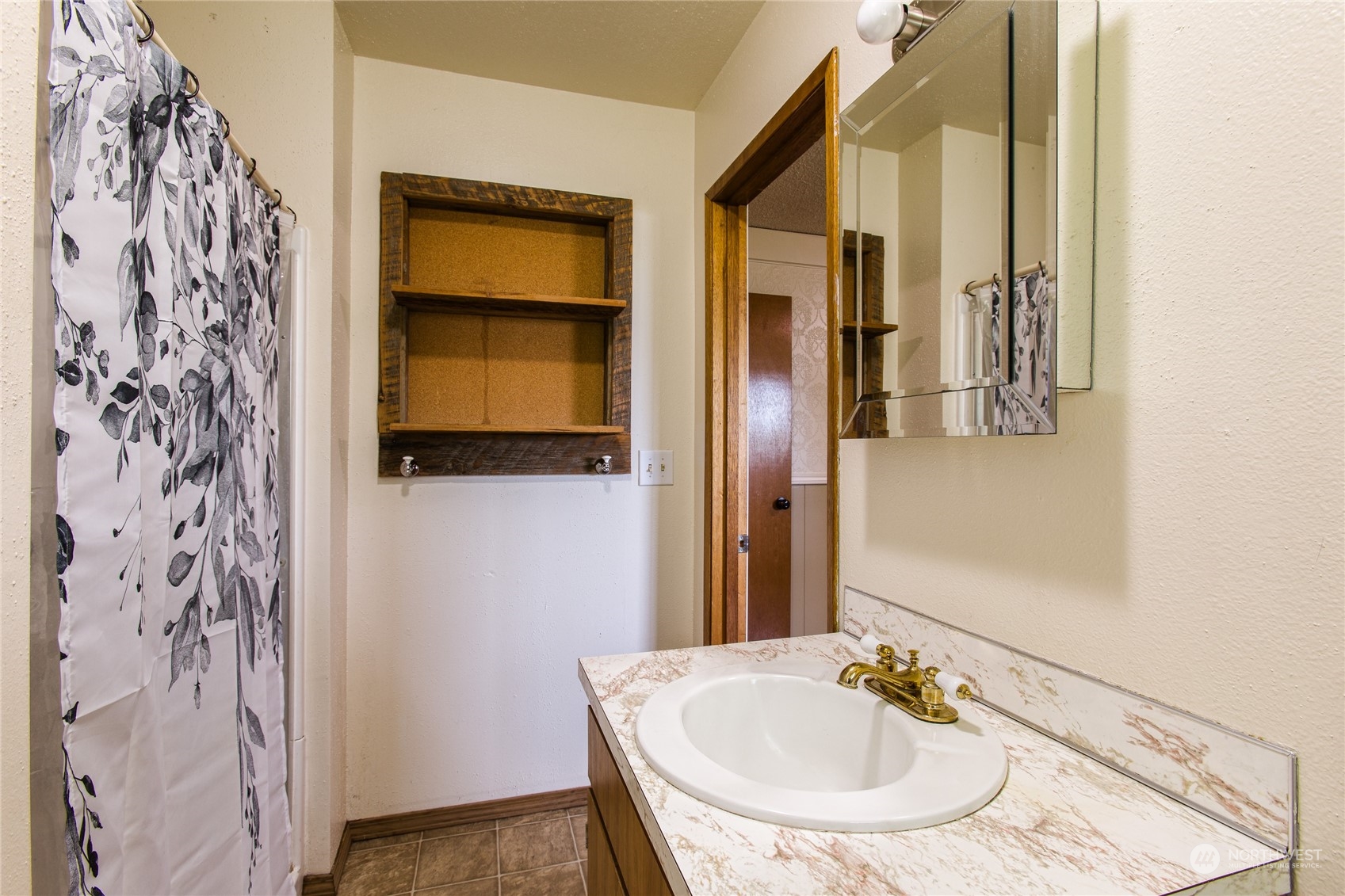 8130 Gillies Road Everson, WA 98247 - Photo 15 of 39 a bathroom with a sink and a mirror