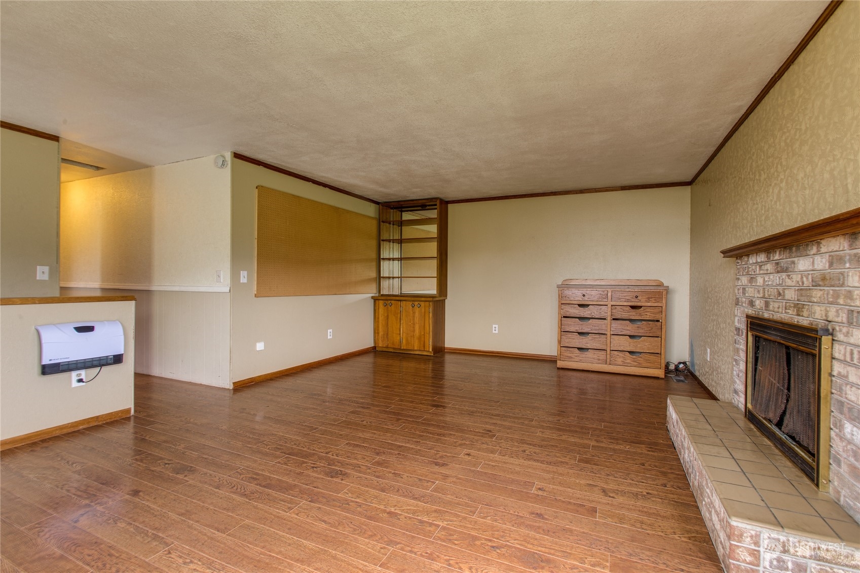 8130 Gillies Road Everson, WA 98247 - Photo 16 of 39 a view of kitchen and empty room with furniture