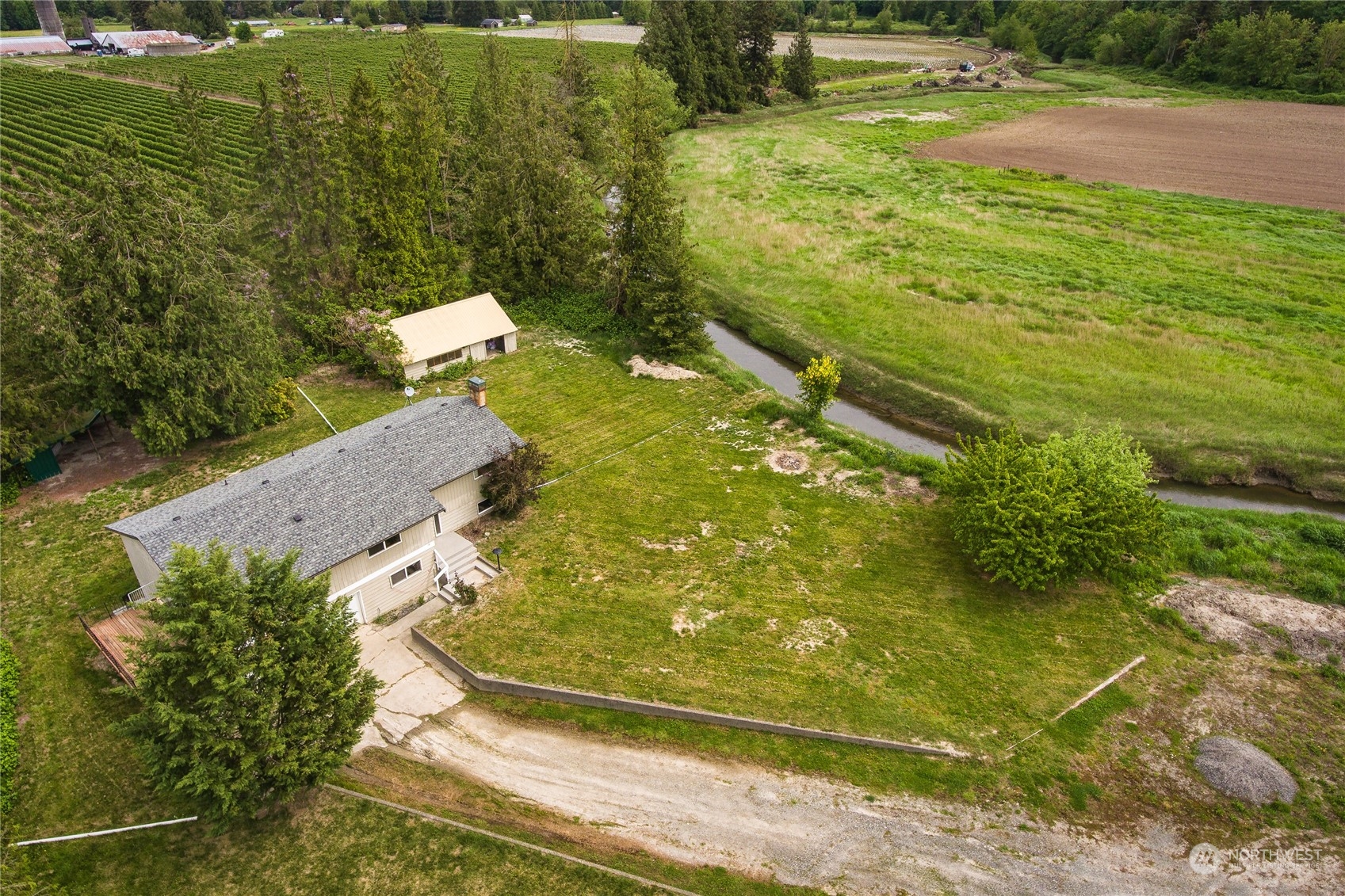8130 Gillies Road Everson, WA 98247 - Photo 2 of 39 a view of a yard with an outdoor space