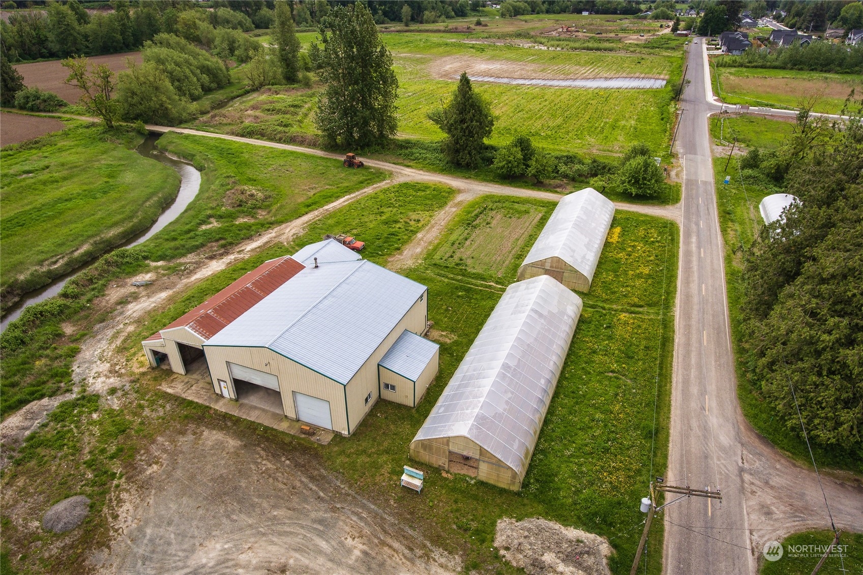 8130 Gillies Road Everson, WA 98247 - Photo 33 of 39 a view of a swimming pool with a yard