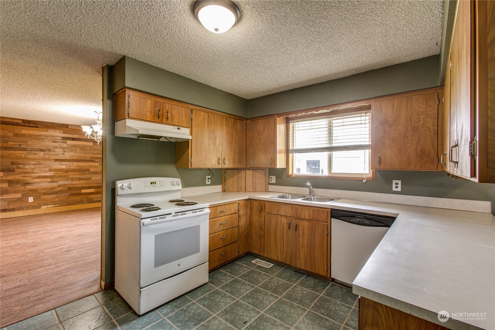 8130 Gillies Road Everson, WA 98247 - Photo 7 of 39 a kitchen with a stove sink and microwave