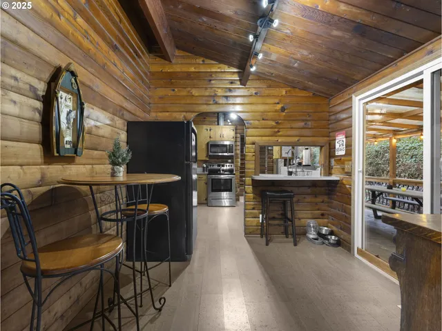 a view of a hallway with seating space