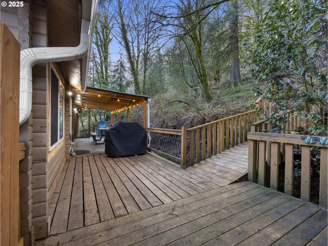 a view of balcony with wooden floor and outdoor space