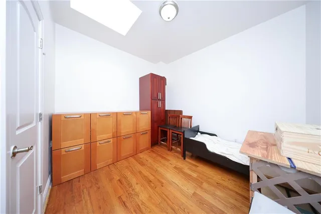 a room with a bed and a desk