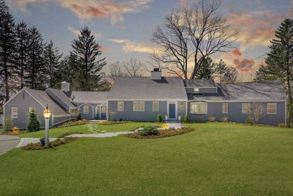 55 Sunset Rock Road Andover, MA 01810 - Photo 1 of 36 a front view of house with yard and green space
