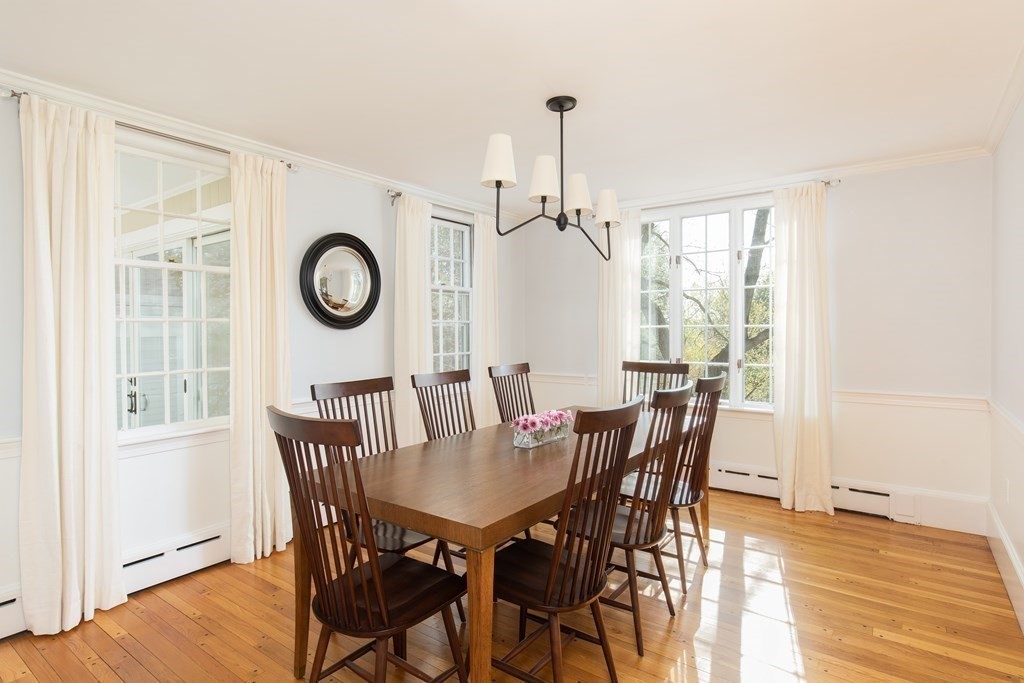 55 Sunset Rock Road Andover, MA 01810 - Photo 15 of 36 a view of a dining room with furniture and window