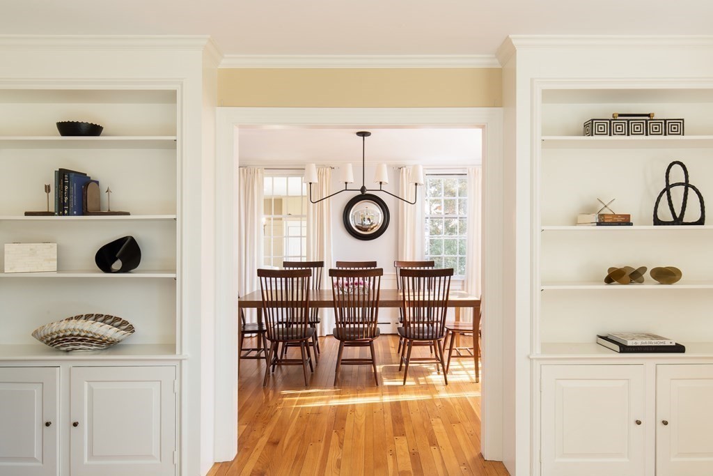 55 Sunset Rock Road Andover, MA 01810 - Photo 16 of 36 a view of dining room and wooden floor