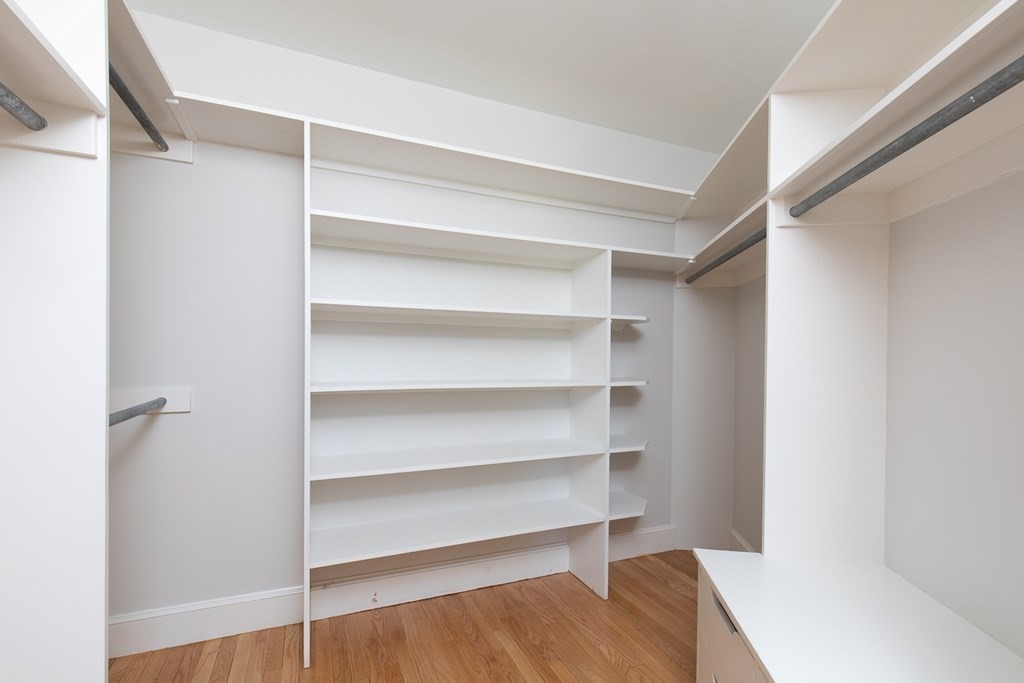 55 Sunset Rock Road Andover, MA 01810 - Photo 21 of 36 a view of walk in closet with empty racks