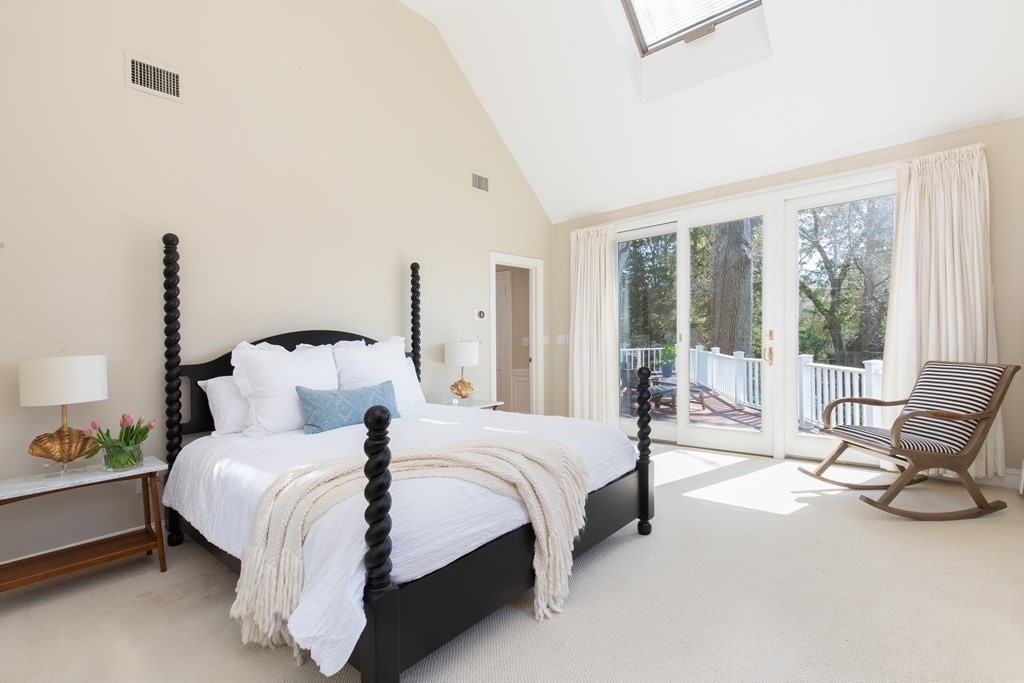 55 Sunset Rock Road Andover, MA 01810 - Photo 22 of 36 a bed room with a bed and a chair