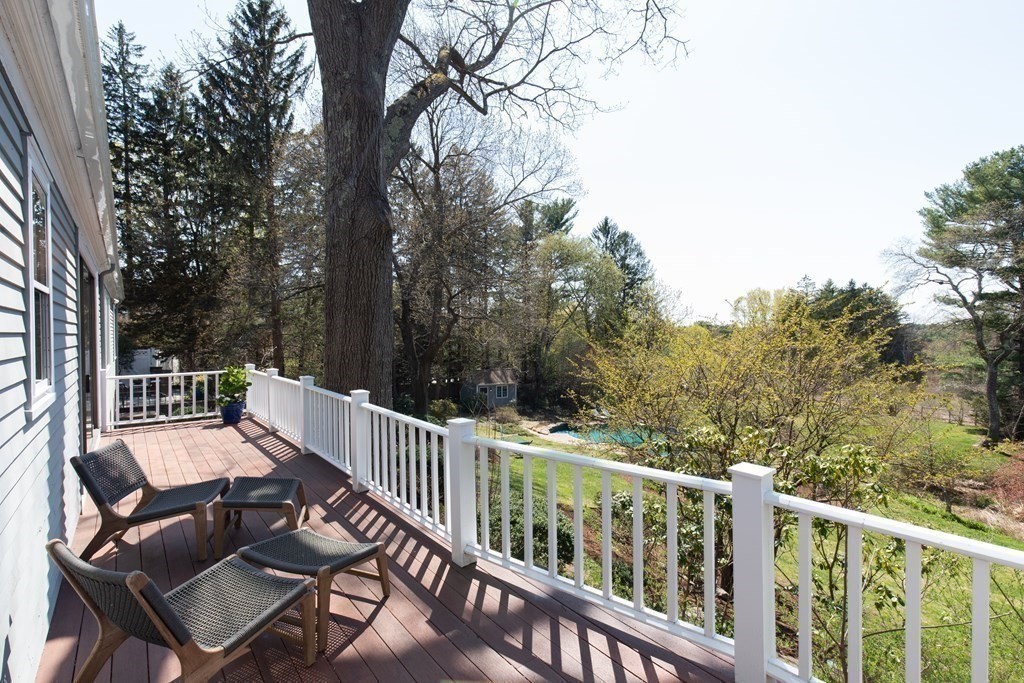 55 Sunset Rock Road Andover, MA 01810 - Photo 24 of 36 a view of a patio with wooden floor