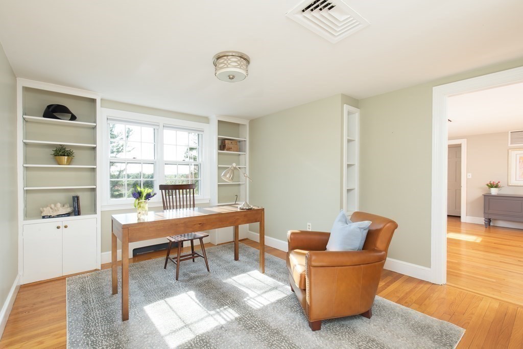 55 Sunset Rock Road Andover, MA 01810 - Photo 26 of 36 a living room with furniture and a window