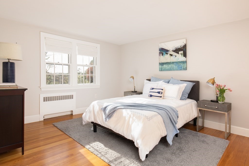 55 Sunset Rock Road Andover, MA 01810 - Photo 27 of 36 a bedroom with bed and a window