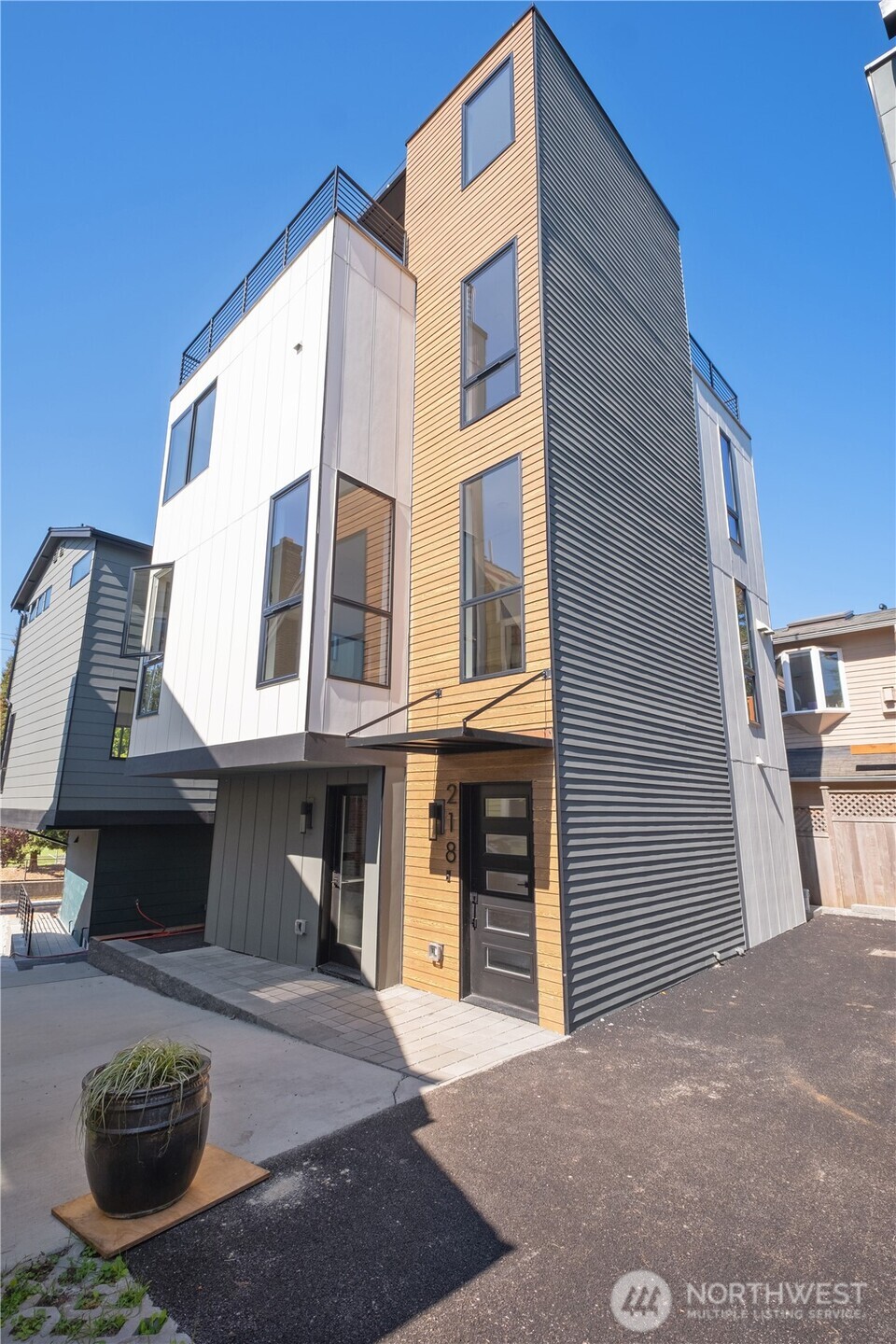 218 21st Avenue East Seattle, WA 98112 - Photo 1 of 38 a front view of a house with parking space