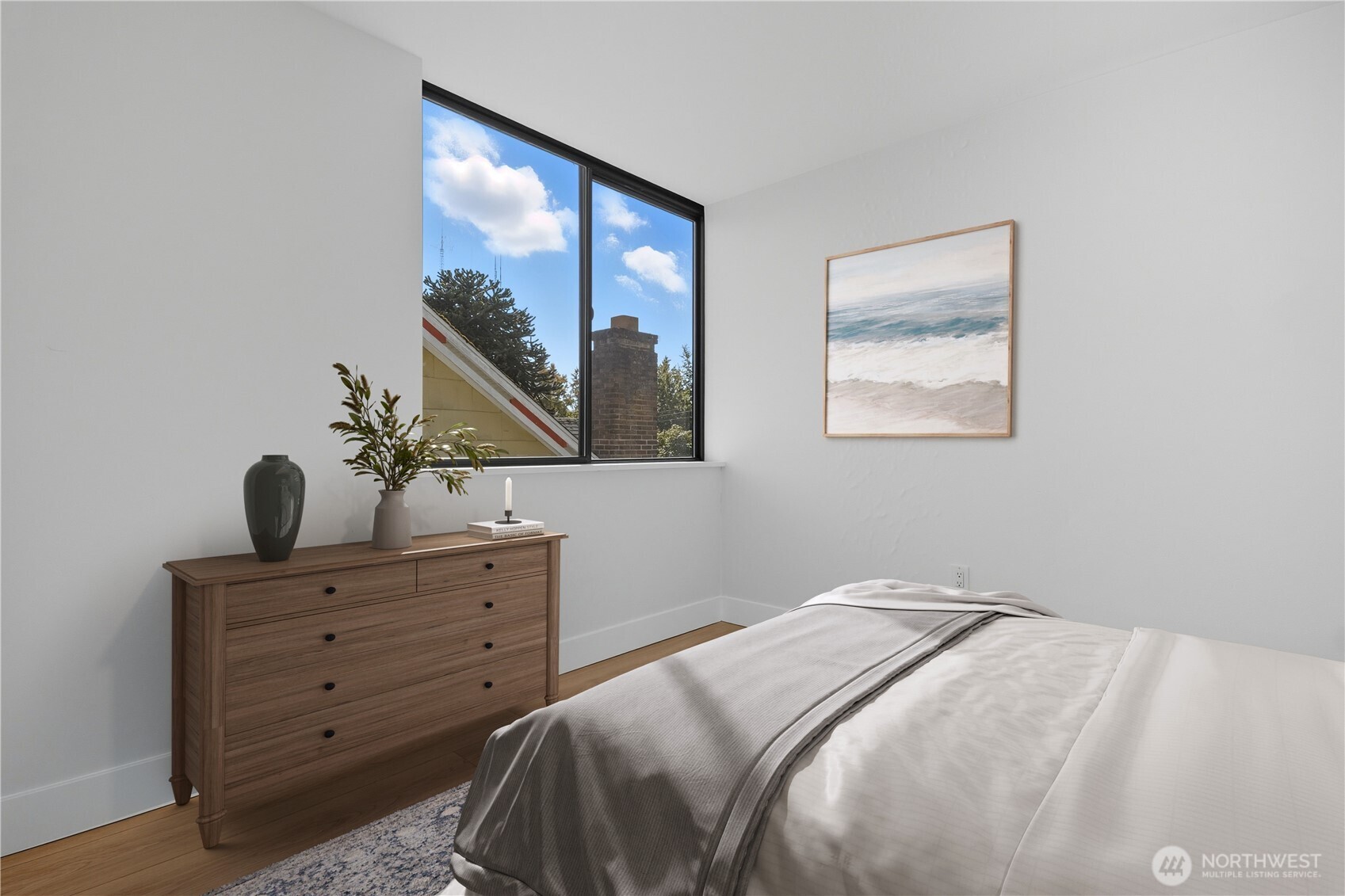 218 21st Avenue East Seattle, WA 98112 - Photo 16 of 38 a bedroom with a bed and a window