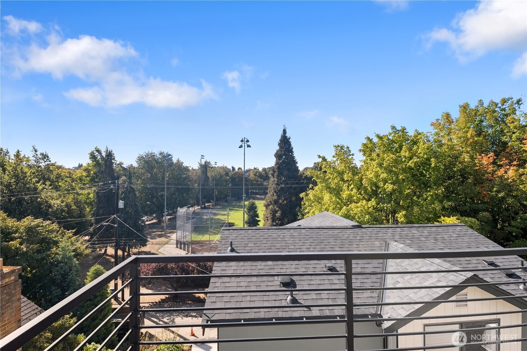 218 21st Avenue East Seattle, WA 98112 - Photo 27 of 38 a terrace view with sitting space and garden