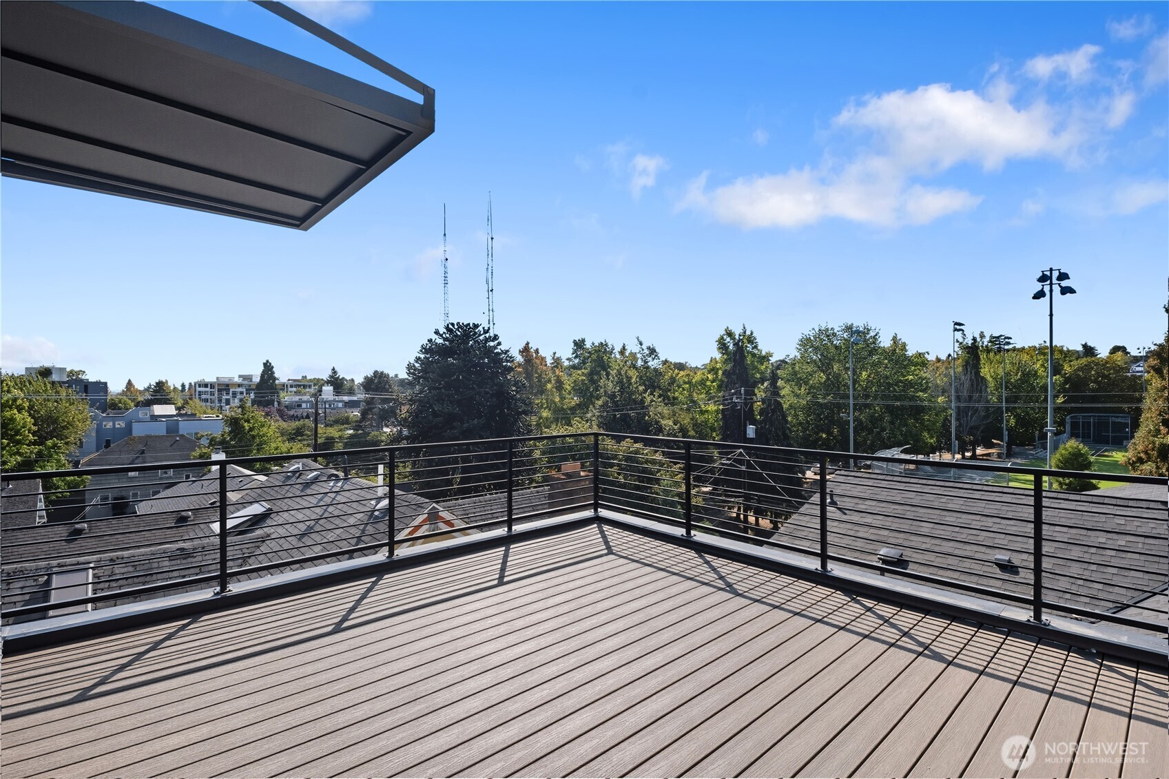 218 21st Avenue East Seattle, WA 98112 - Photo 29 of 38 a view of a terrace with sky view