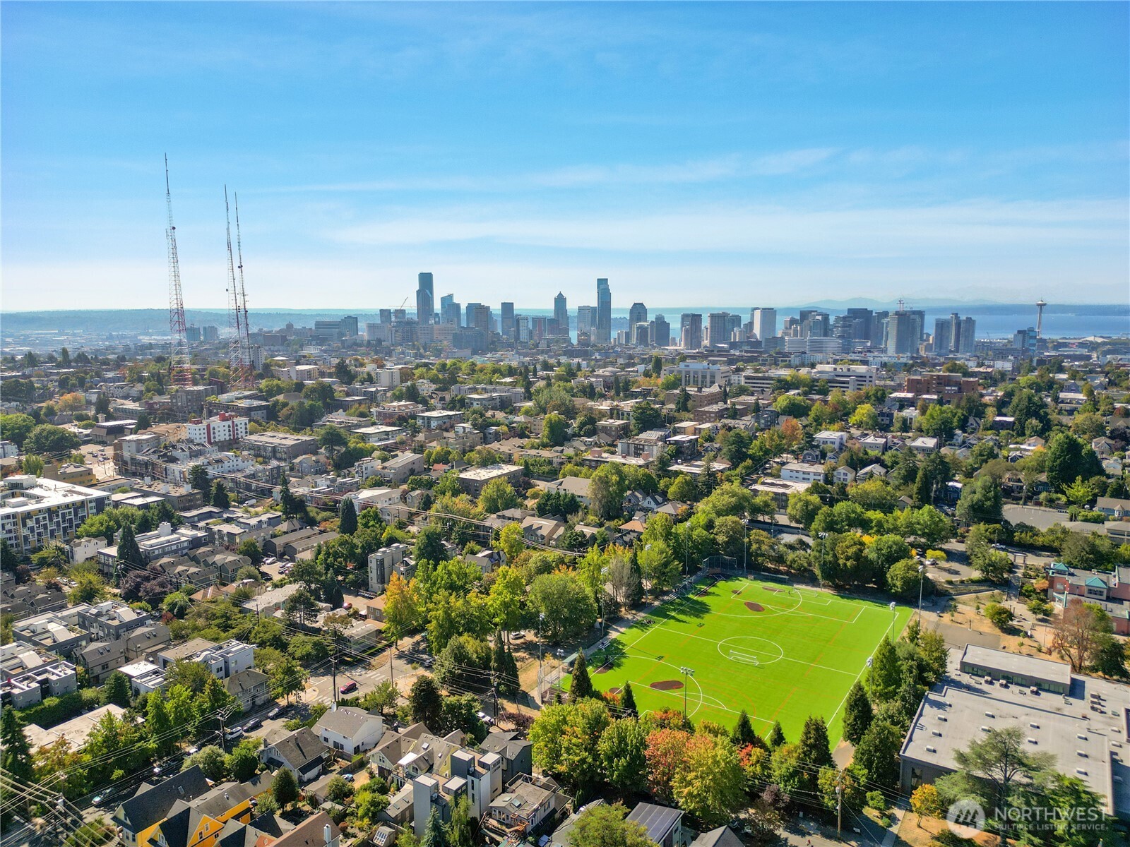 218 21st Avenue East Seattle, WA 98112 - Photo 32 of 38 an aerial view of a residential houses with outdoor space and trees all around