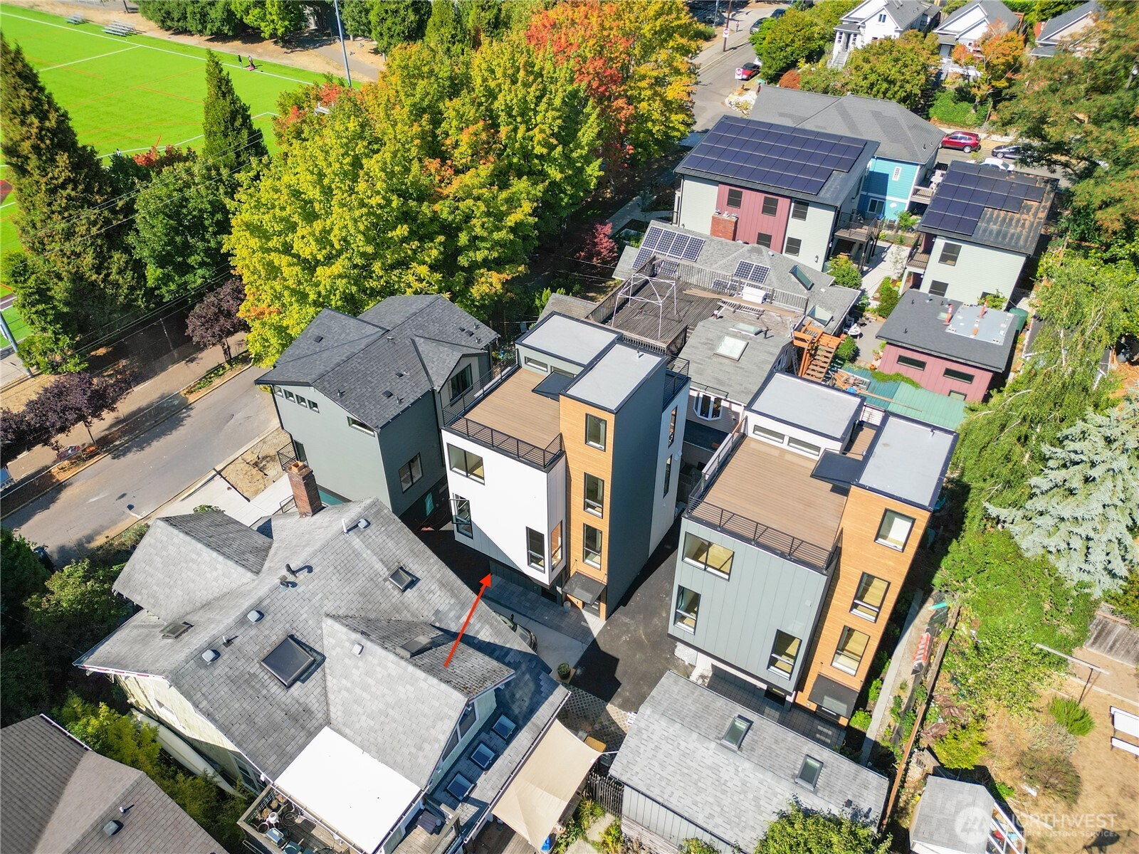 218 21st Avenue East Seattle, WA 98112 - Photo 35 of 38 an aerial view of multiple houses with yard