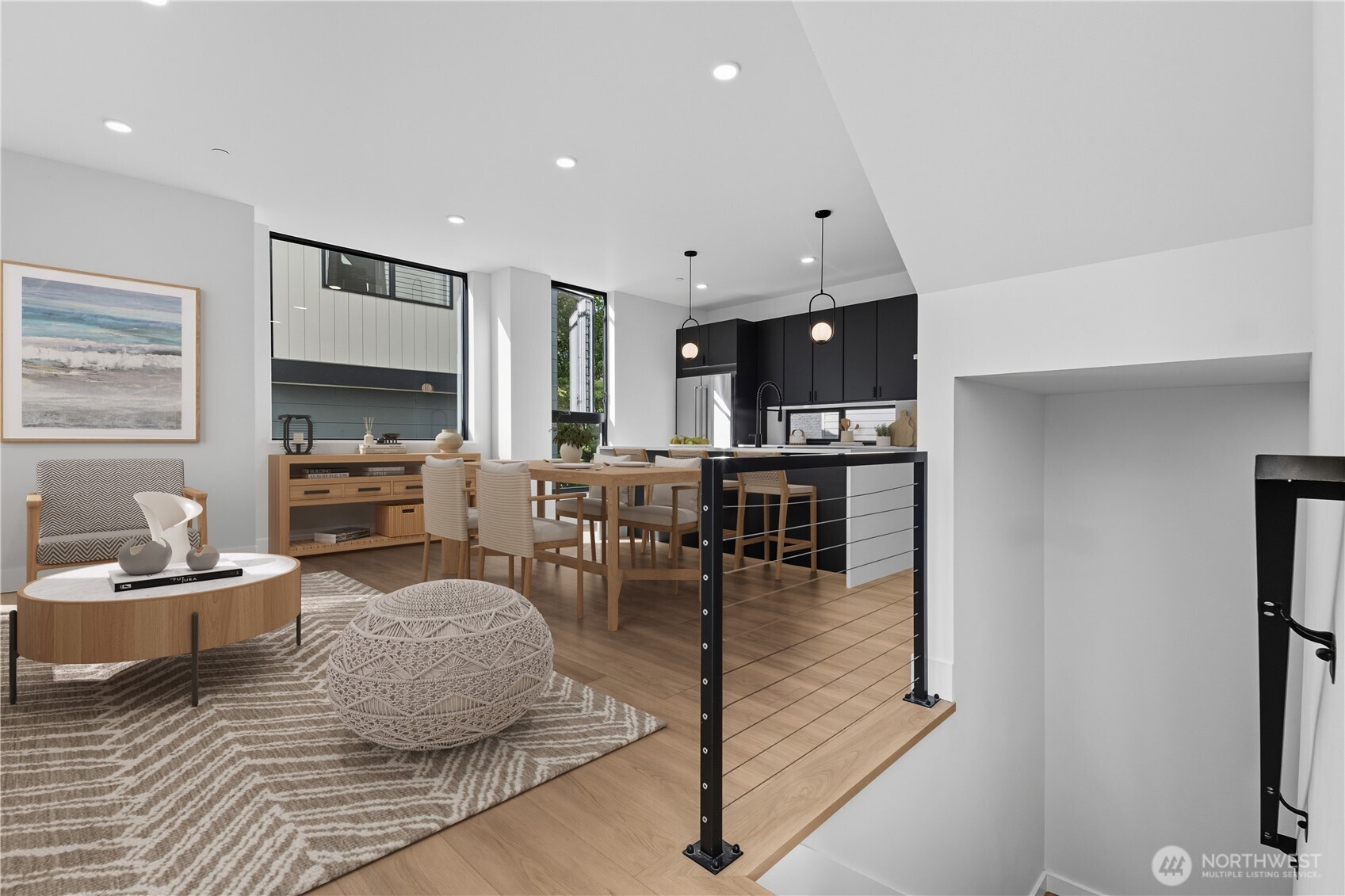 218 21st Avenue East Seattle, WA 98112 - Photo 4 of 38 a living room with furniture kitchen view and a wooden floor