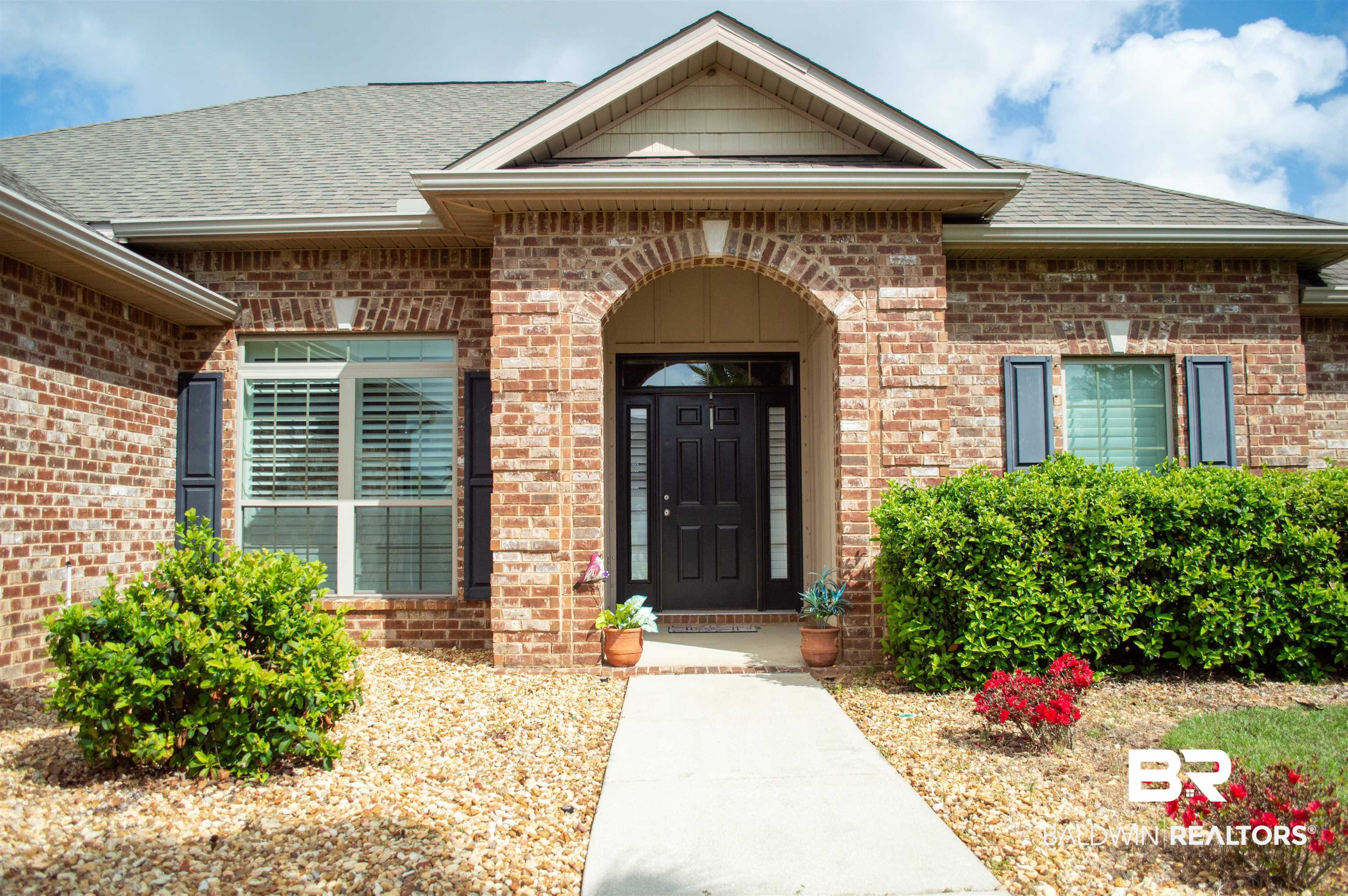 1124 West Orlando Drive Foley, AL 36535 - Photo 2 of 51 Property entrance with brick siding and a shingled roof