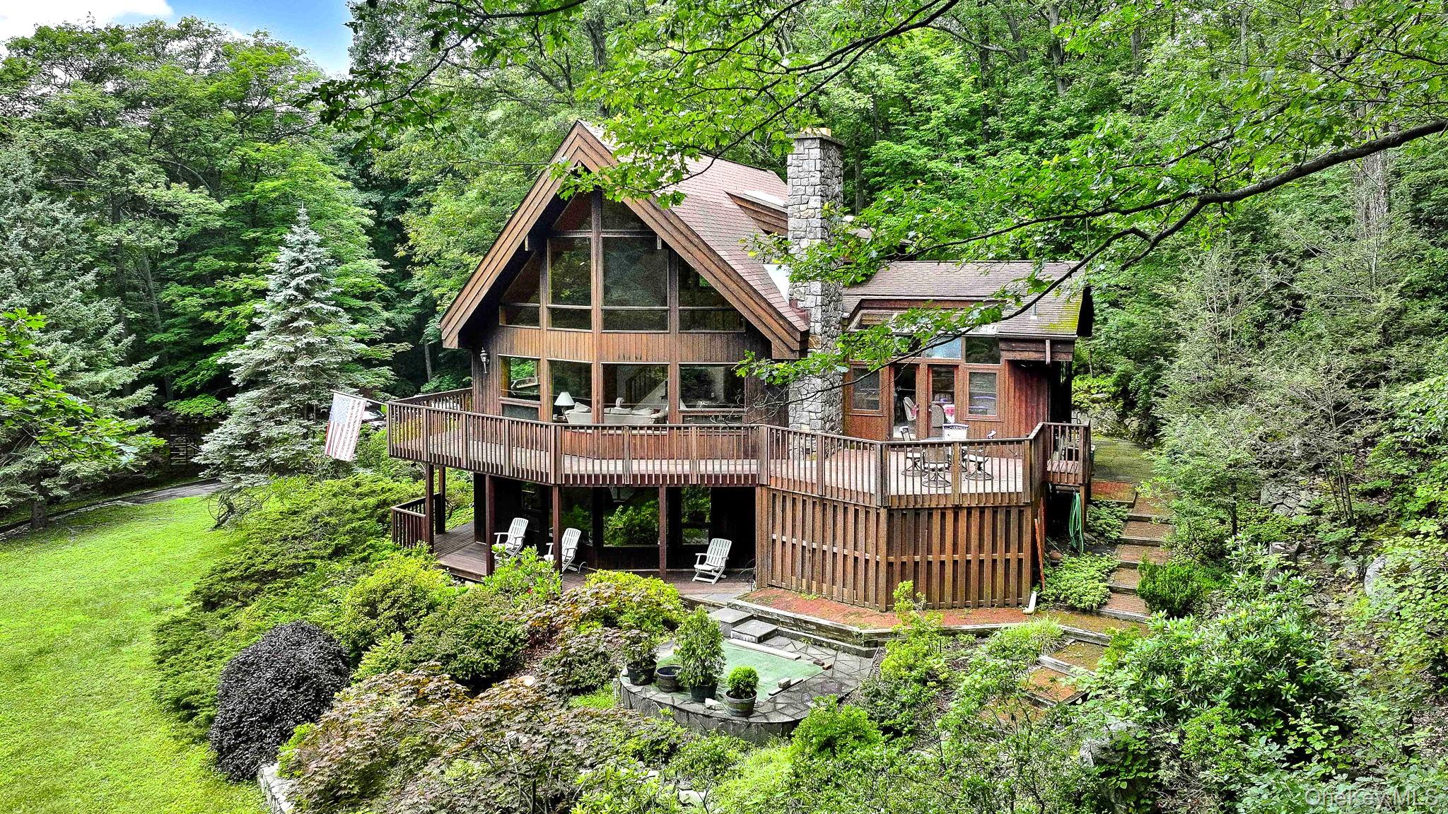 an aerial view of a house with a balcony