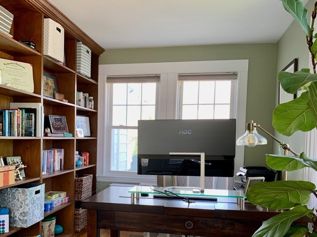 15 Maypole Road Quincy, MA 02169 - Photo 14 of 28 a view of workspace with a bookshelf