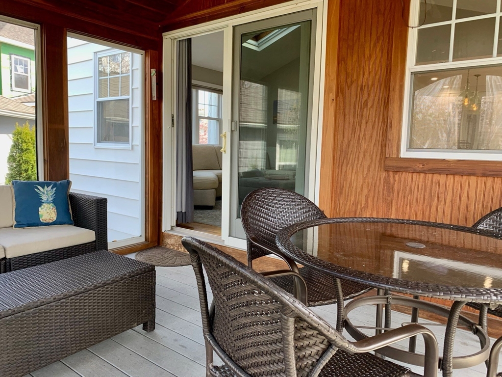 15 Maypole Road Quincy, MA 02169 - Photo 17 of 28 a living room with furniture and a window