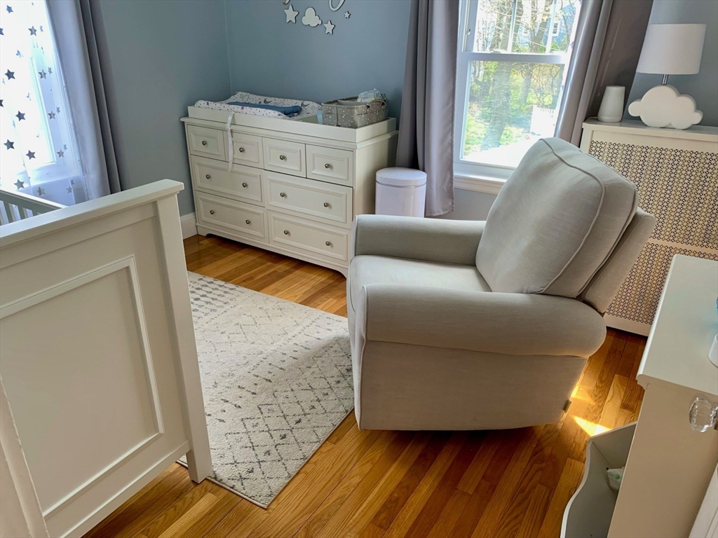 15 Maypole Road Quincy, MA 02169 - Photo 22 of 28 a living room with furniture and a window
