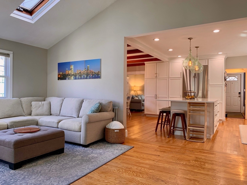 15 Maypole Road Quincy, MA 02169 - Photo 3 of 28 a living room with furniture and a wooden floor