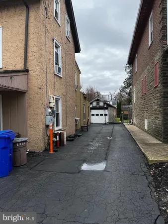 a view of a street with cars