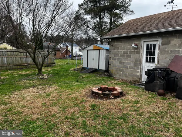 a backyard of a house with seating space
