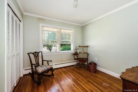 a room with furniture and a window