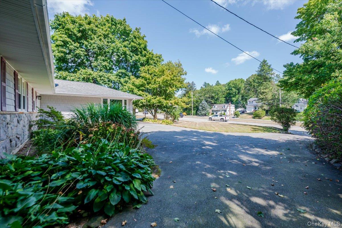237 Oakwood Road Huntington, NY 11743 - Photo 21 of 29 a view of yard with swimming pool and green space
