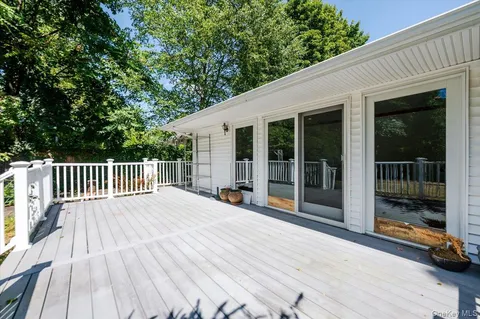 a view of balcony with seating space