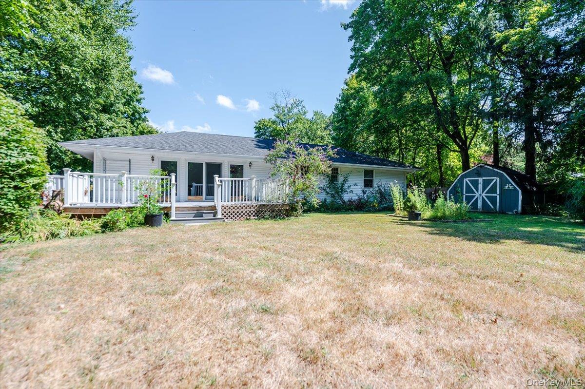 237 Oakwood Road Huntington, NY 11743 - Photo 29 of 29 front view of a house with a yard