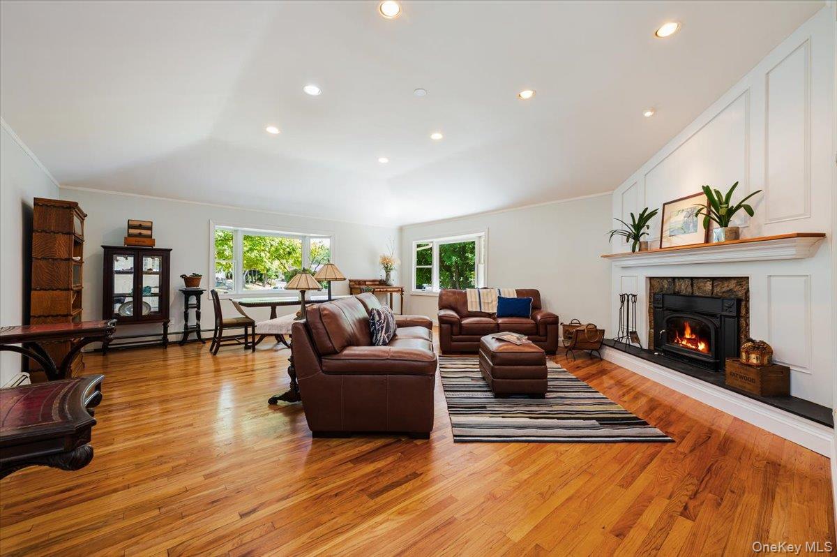 237 Oakwood Road Huntington, NY 11743 - Photo 8 of 29 a living room with furniture and a fireplace