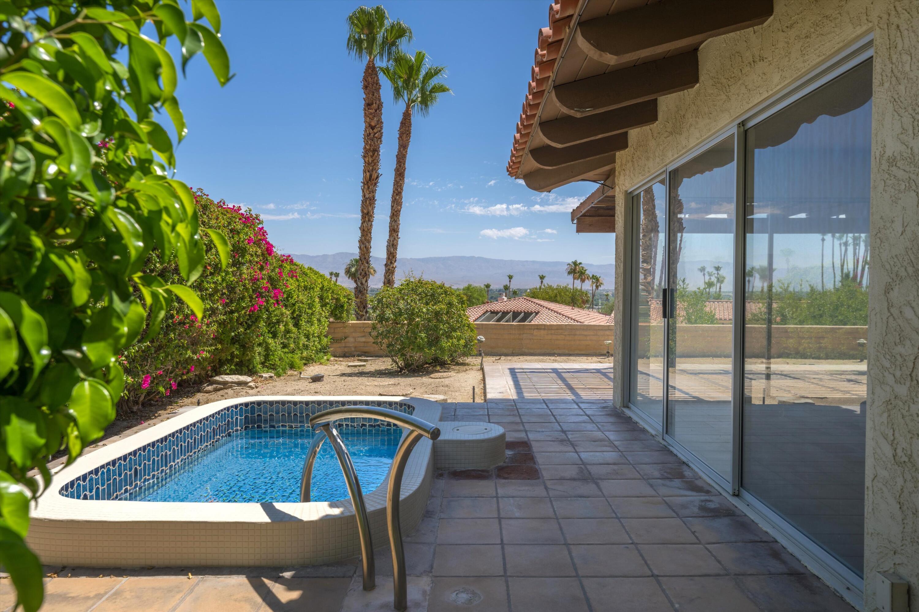 40270 Paseo Del Rey Rancho Mirage, CA 92270 - Photo 2 of 41 a view of balcony with a potted plant