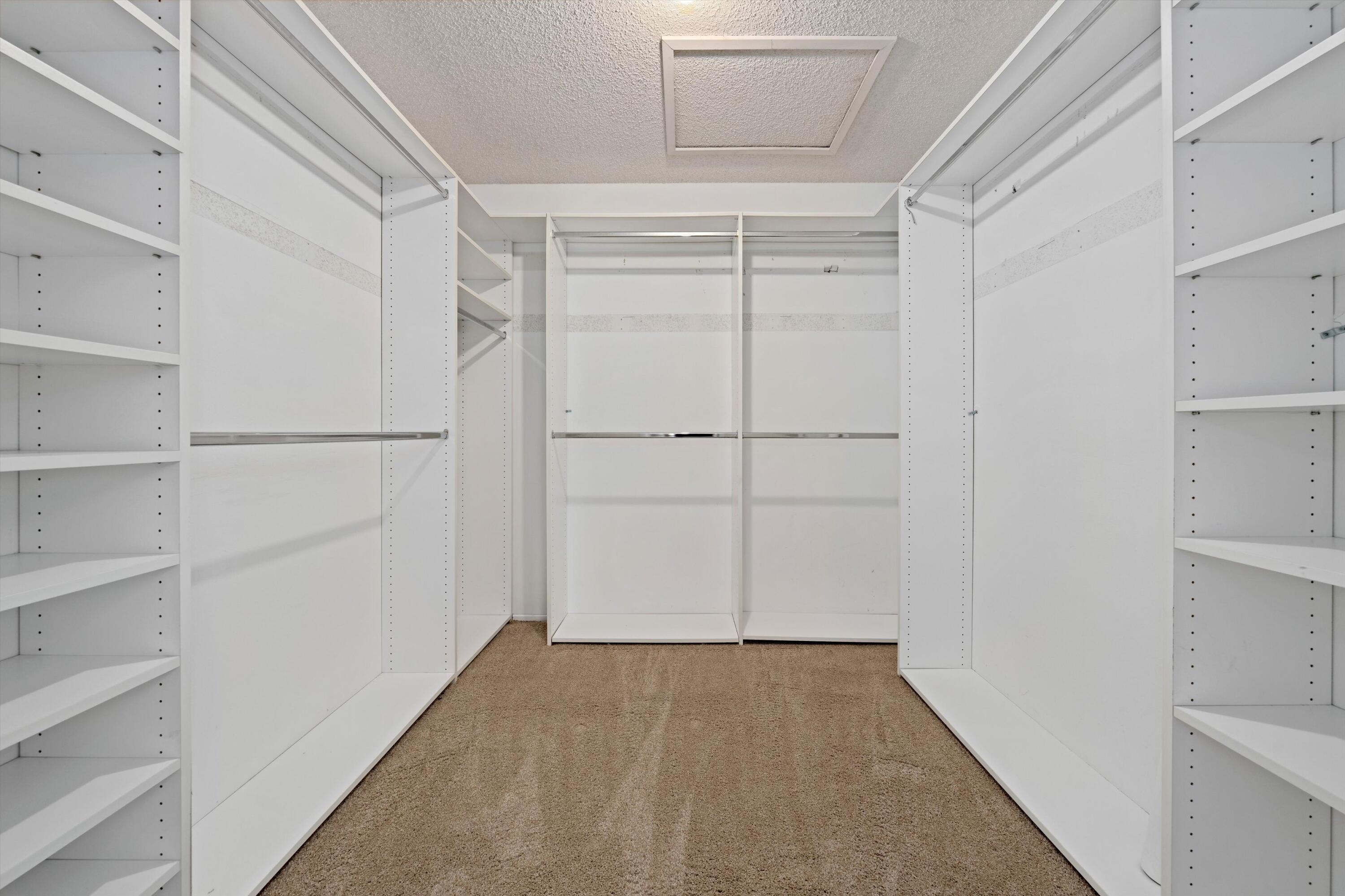 40270 Paseo Del Rey Rancho Mirage, CA 92270 - Photo 25 of 41 a view of an empty walk in closet
